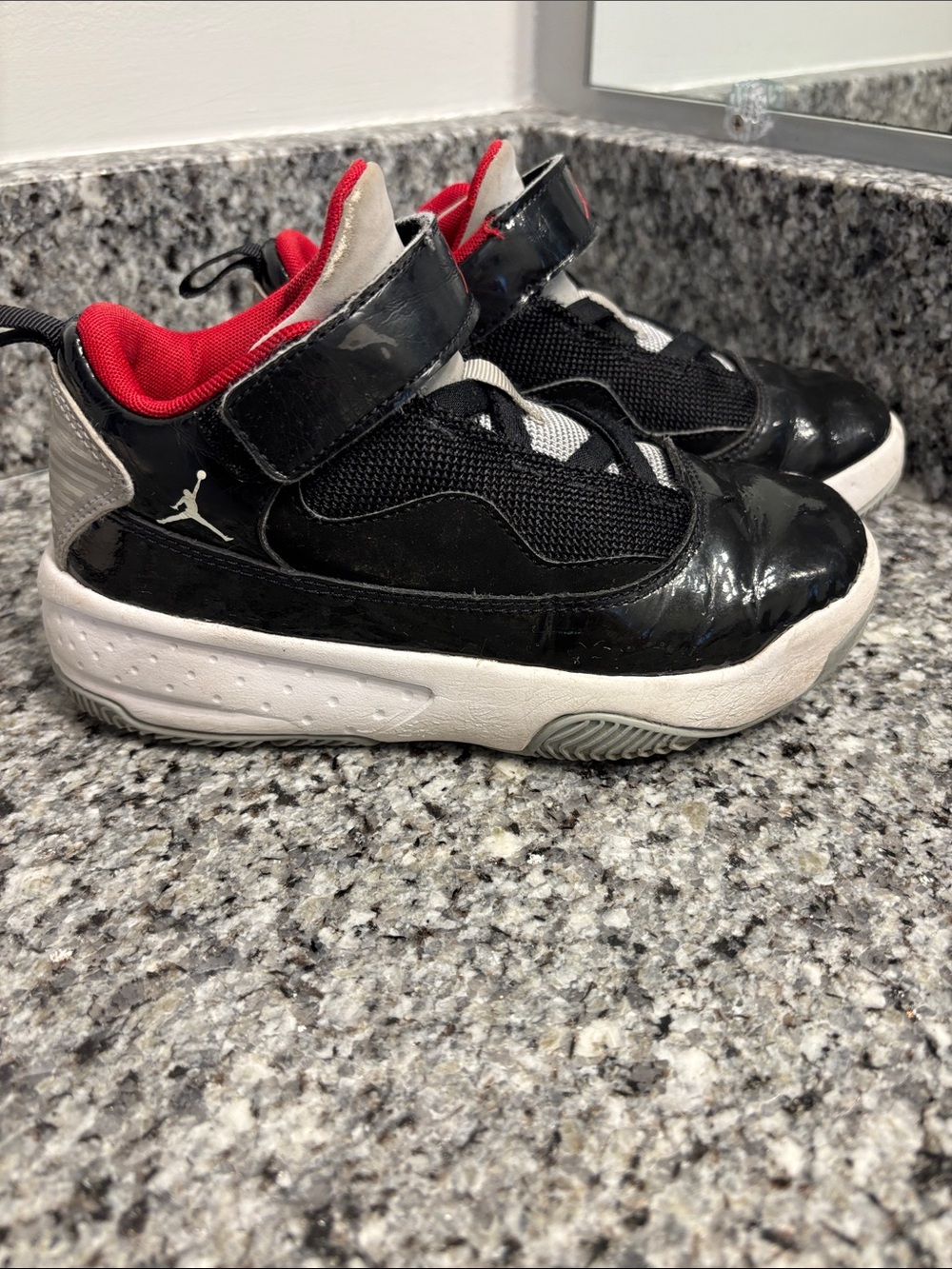 Jordan Kids Black and Red Basketball Sneakers with White Sole